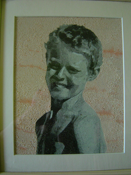 tableau en sable coloré: Portrait d`enfant